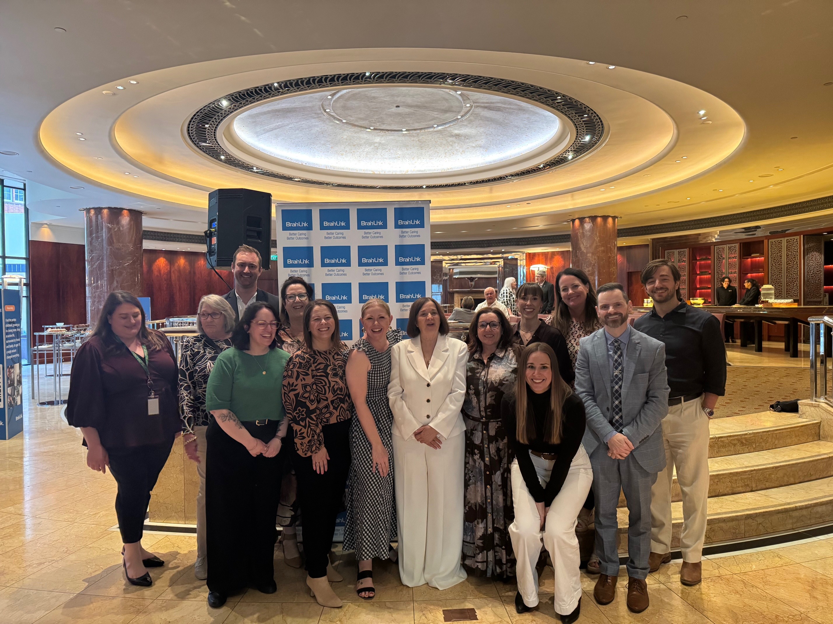 BrainLink staff team gathering for a photo.