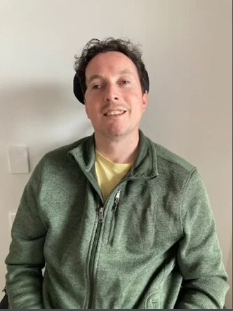 Paul who lives with a traumatic brain injury and has gradually recovered through positivity and with key support.